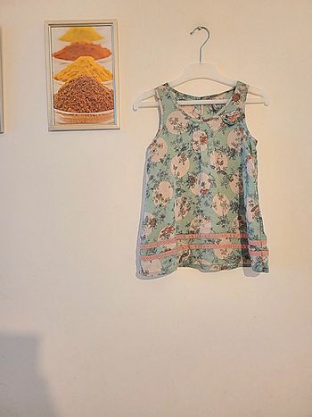 Haut léger fleuri "orchestra" taille 10 ans