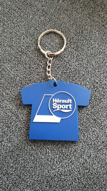 Neuf porte clés bleu Hérault sport