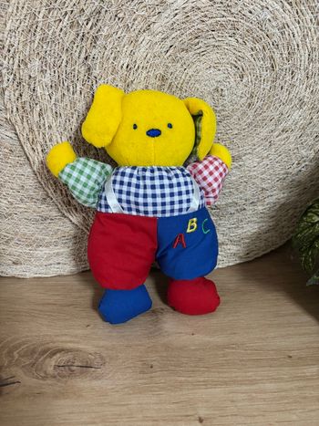 Vintage peluche chien grelot jaune rouge bleu Simpson trading