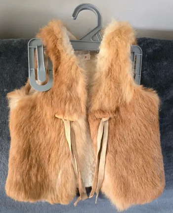 Veste sans manches fausse fourrure
