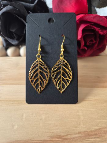 boucles d’oreilles pendentif plume