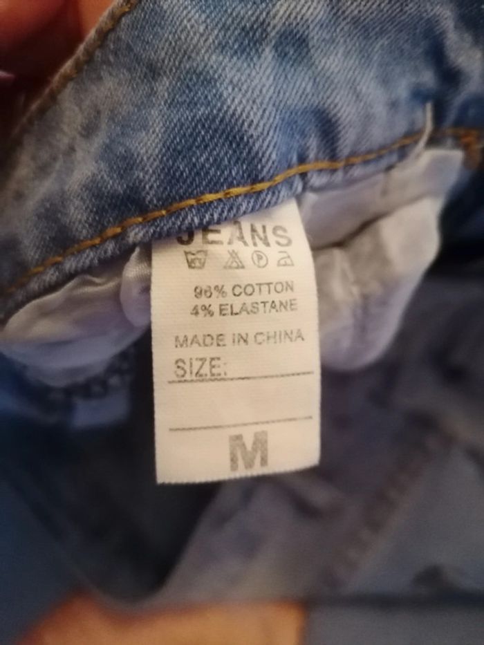 Jeans troué bleu clair - photo numéro 7