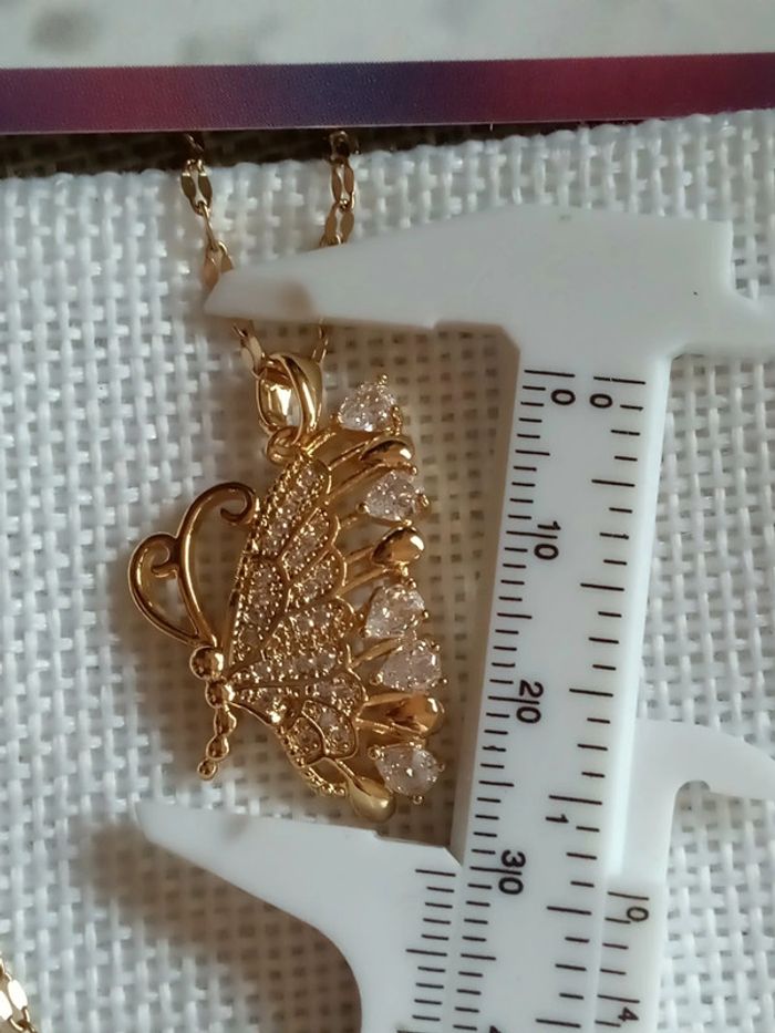 Collier papillon 🦋. - photo numéro 3