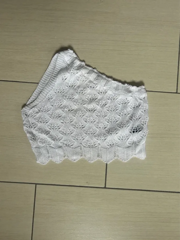 Top asymétrique tricot
