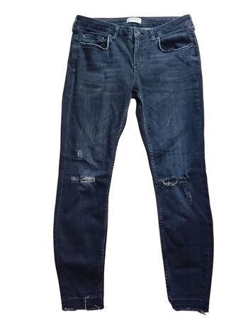 Jean skinny troué taille 40
