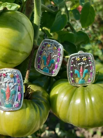 Lot composé d'une paire de  boucles d'oreilles et d'une  bague réglable  franck herval