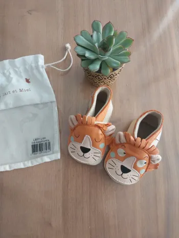 Chaussons lion 0-6mois