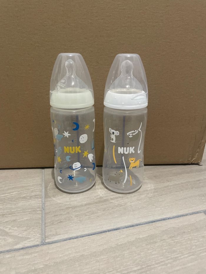 2 biberons nuk
