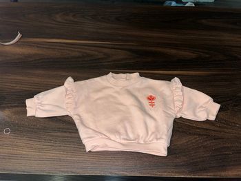 Joli pull corail