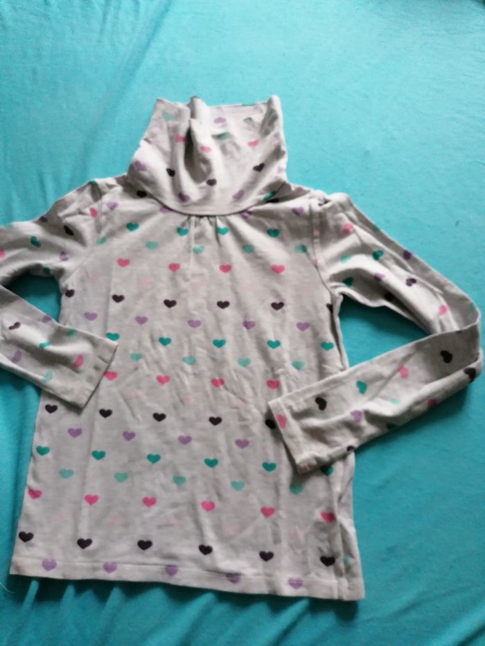 Pull avec col, motif coeur