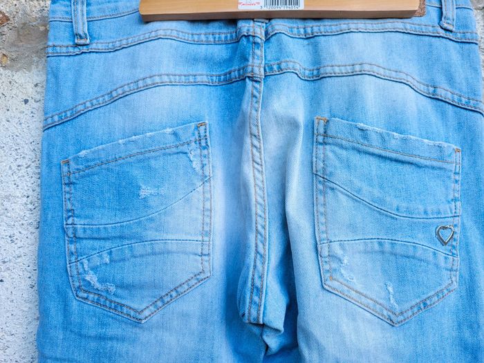Superbe jeans 👖 Please effet délavé, troué avec dentelle taille Medium (38/40) - photo numéro 8