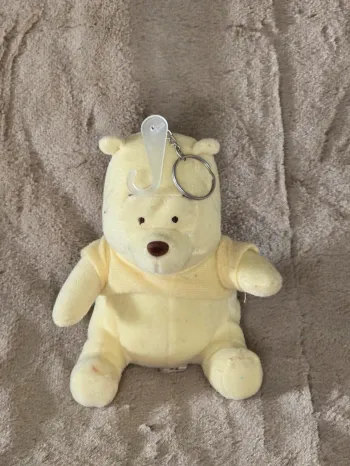 peluche porte cléf Winnie jaune