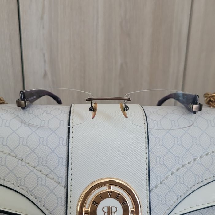 Monture de lunette Vintage, femme, forme rectangulaire, pas tres haute. Marque  Kenzo