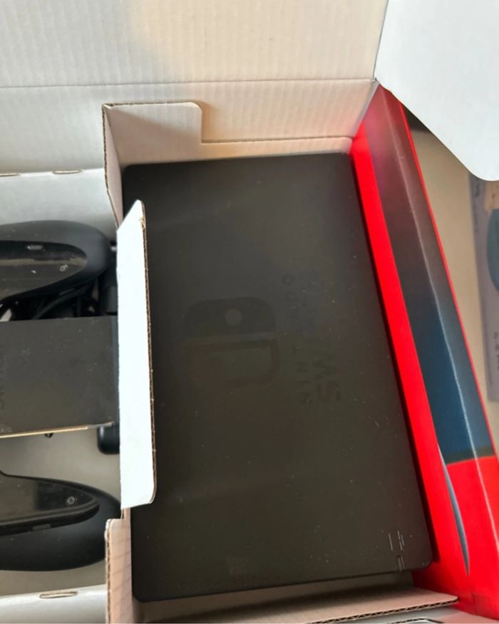 Nintendo Switch + accessoires - photo numéro 6