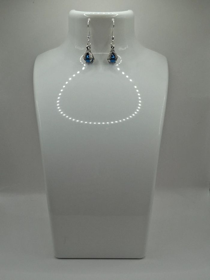 Boucle d'oreille patte de dragon