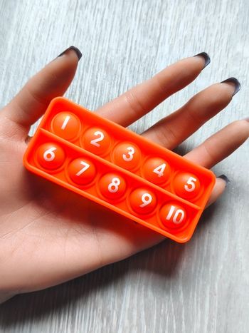 Pop it orange pour compter jusqu'à 10