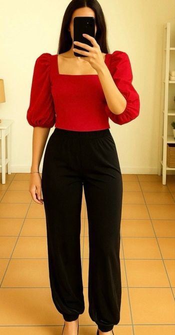 Pantalon noir resserré à la cheville 38