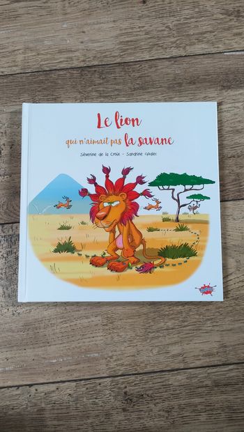 Livre le lion qui n'aimait pas la savane