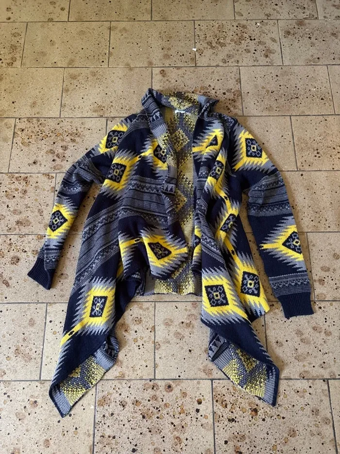 Gilet a pans long motif astek