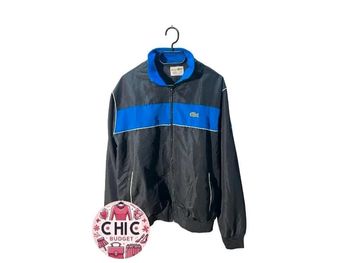 Veste Noire et Bleu - Lacoste - Taille 5 - Parfait État.