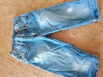 Jean délavé effet use