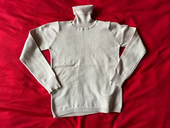 Joli pull col roulé beige