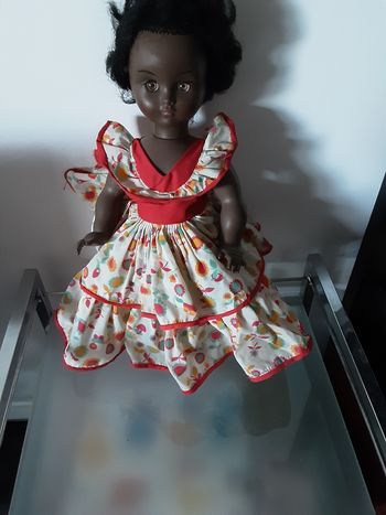 Poupée  marque bella de 30 cm avec sa robe