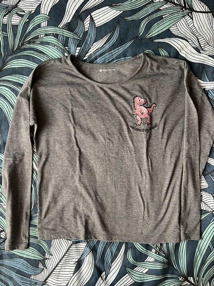 TEE shirt dinosaure rose gémo taille 14 ans