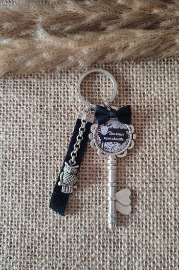 Porte clés une soeur super chouette