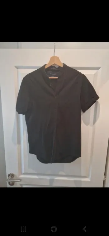 Beau pola zara homme noir taille s Très bon état