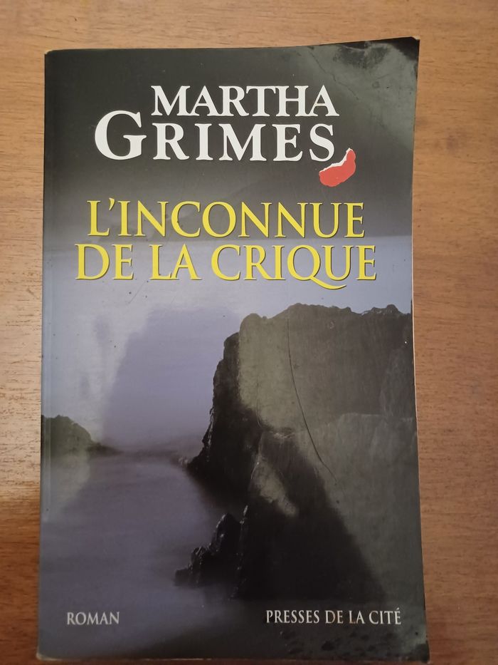 Roman "l'inconnue de la crique "