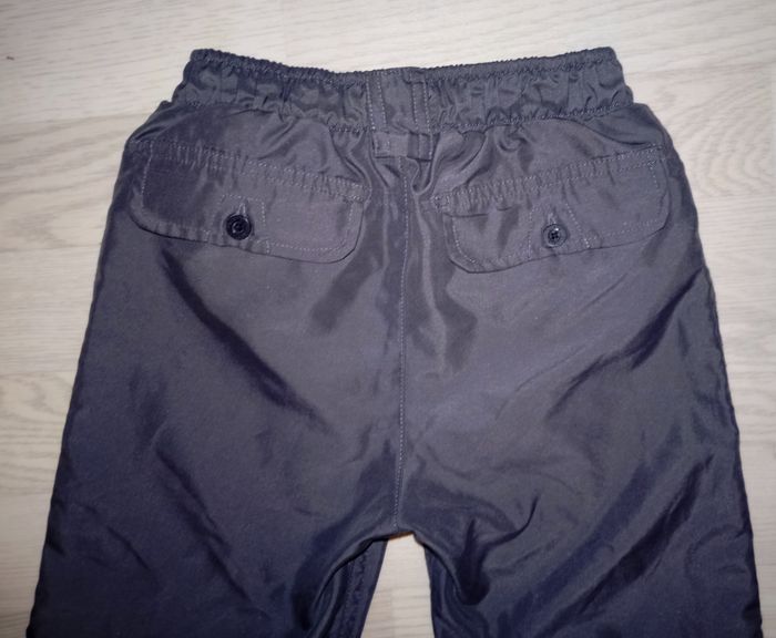 Pantalon léger en nylon gris anthracite foncé genre baggy Tissaia
T. 9 ans
NEUF - photo numéro 4