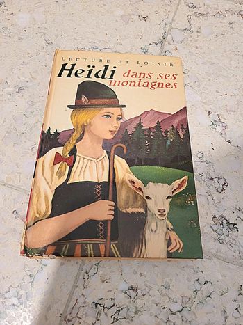 Livre Heidi dans ses montagnes de johanna spyri de 1975