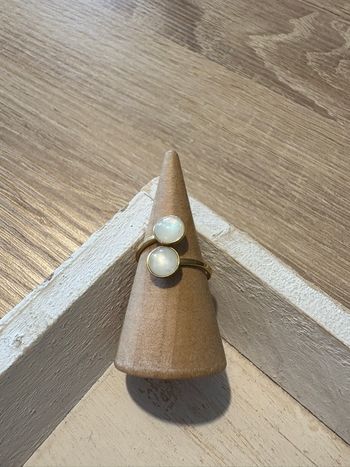 Bague dorée et blanche