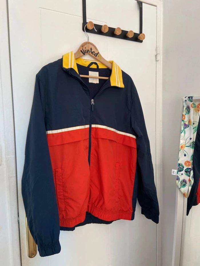 Coupe-vent bleu marine et rouge H&M Taille L