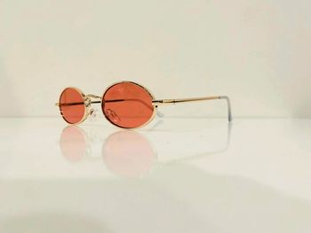 Lunette de soleil femme ovale dorée  UV protection catégorie 2 taille small