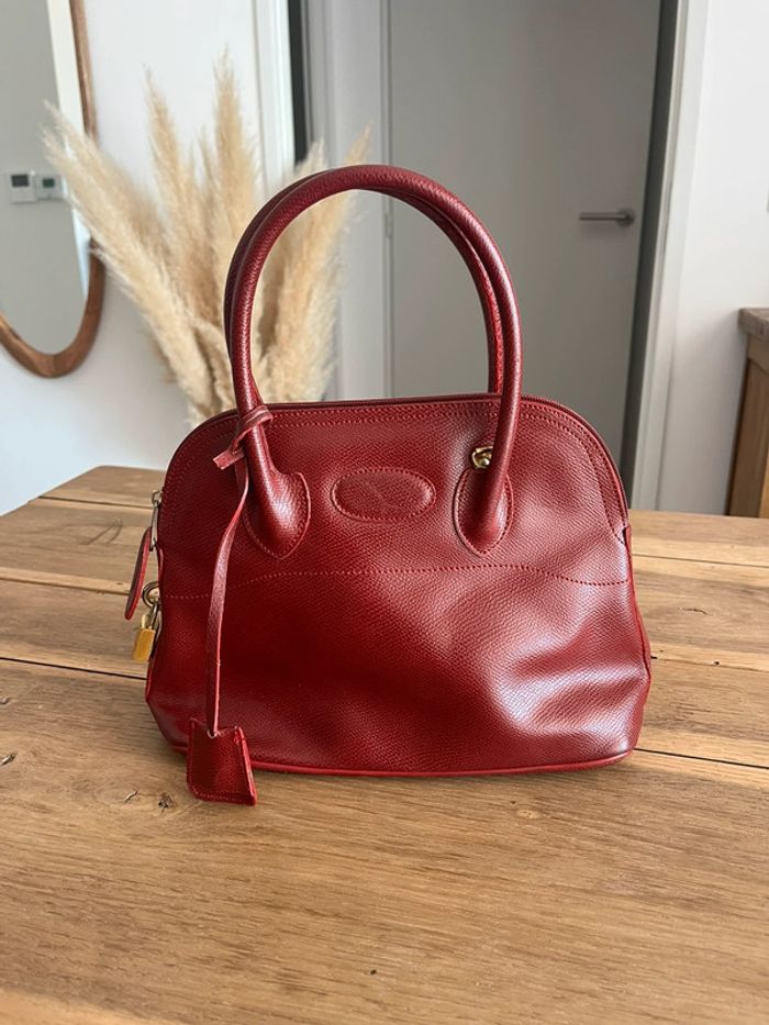 Sac à main en cuir rouge vintage