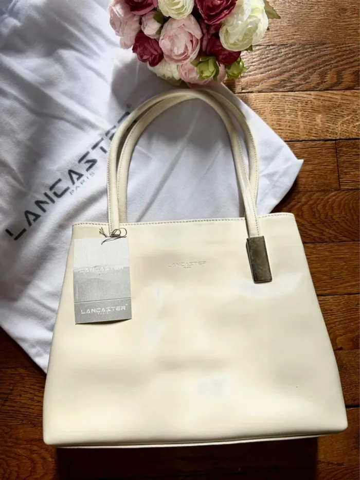Sac creme cuir Lancaster NEUF avec etiquette