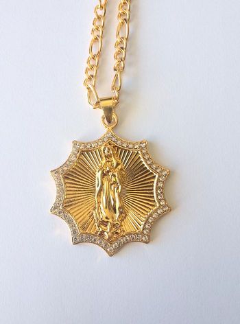 Chaîne + pendentif religieux