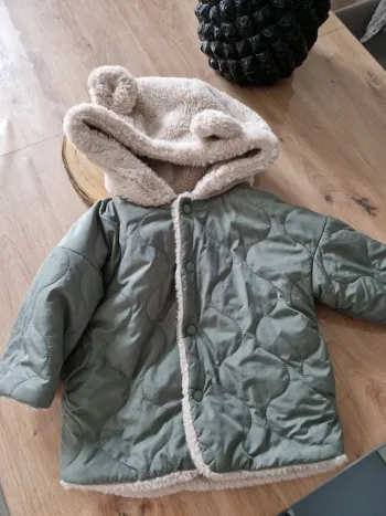 Manteau imperméable fourrure