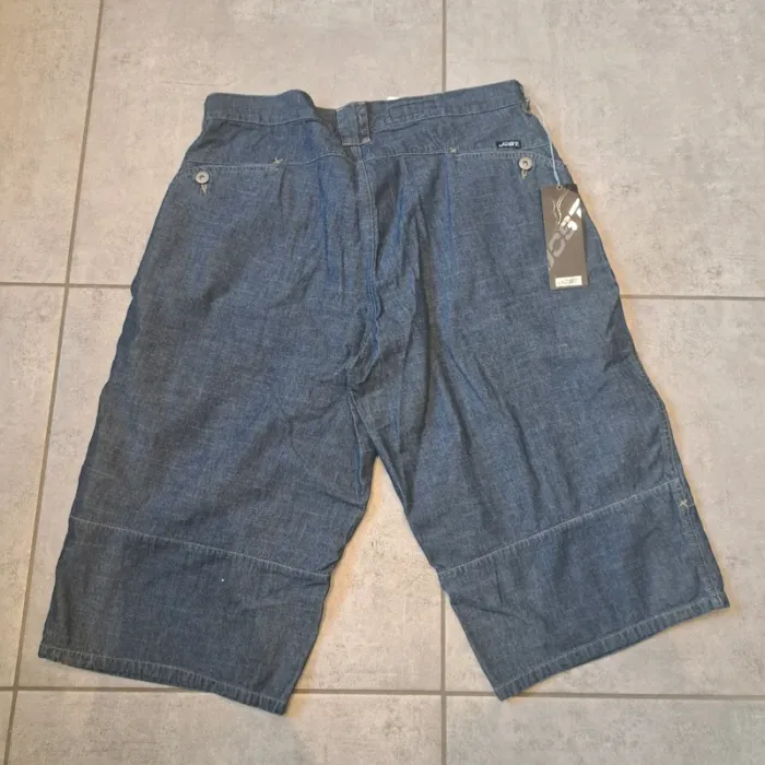 Jeans hauteur genoux
