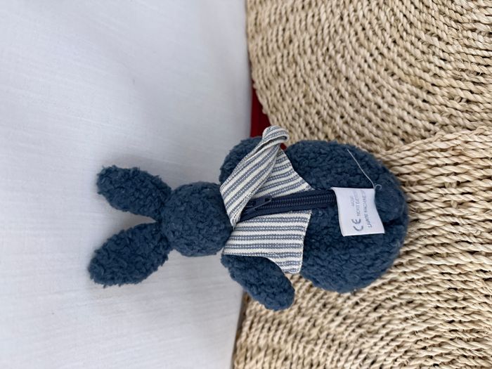 Petit doudou porte monnaie lapin bleu Moulin Roty - photo numéro 2