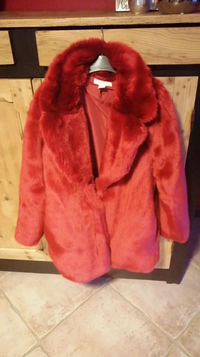 Veste chaude hiver. Marque H et M. Taille 38