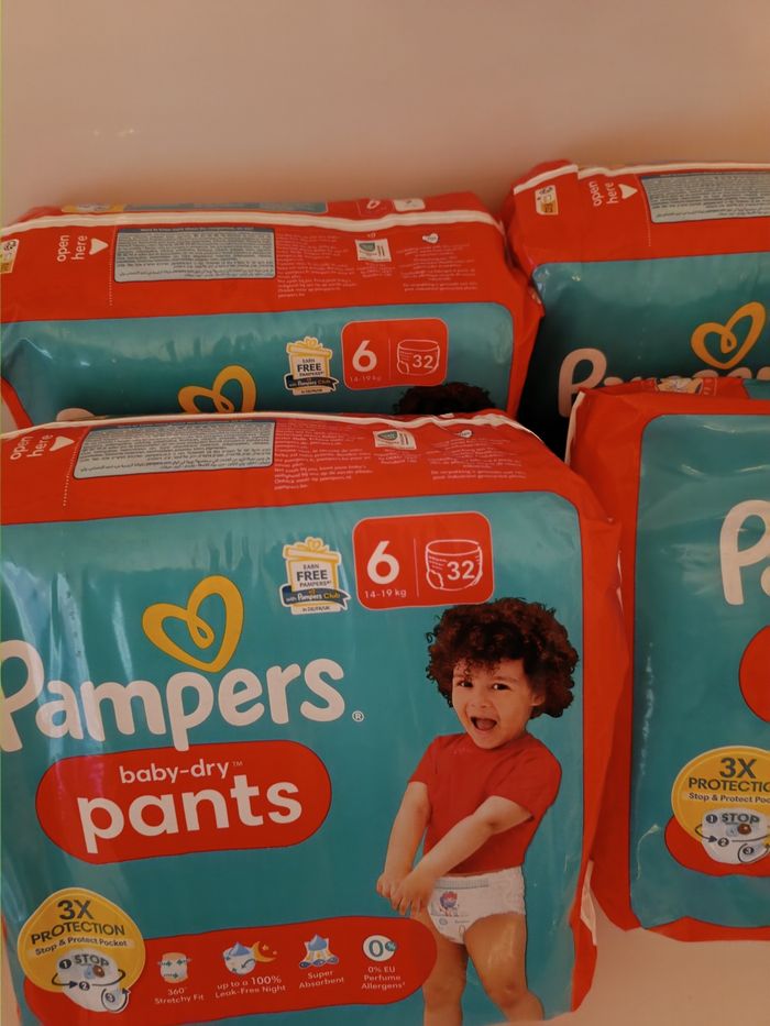 4 paquets Pampers taille 6