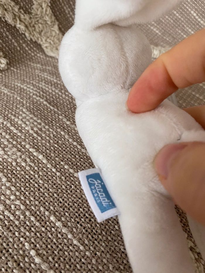 Peluche doudou d’éveil 17cm jacadi lapin blanc anneaux parfait état - photo numéro 4