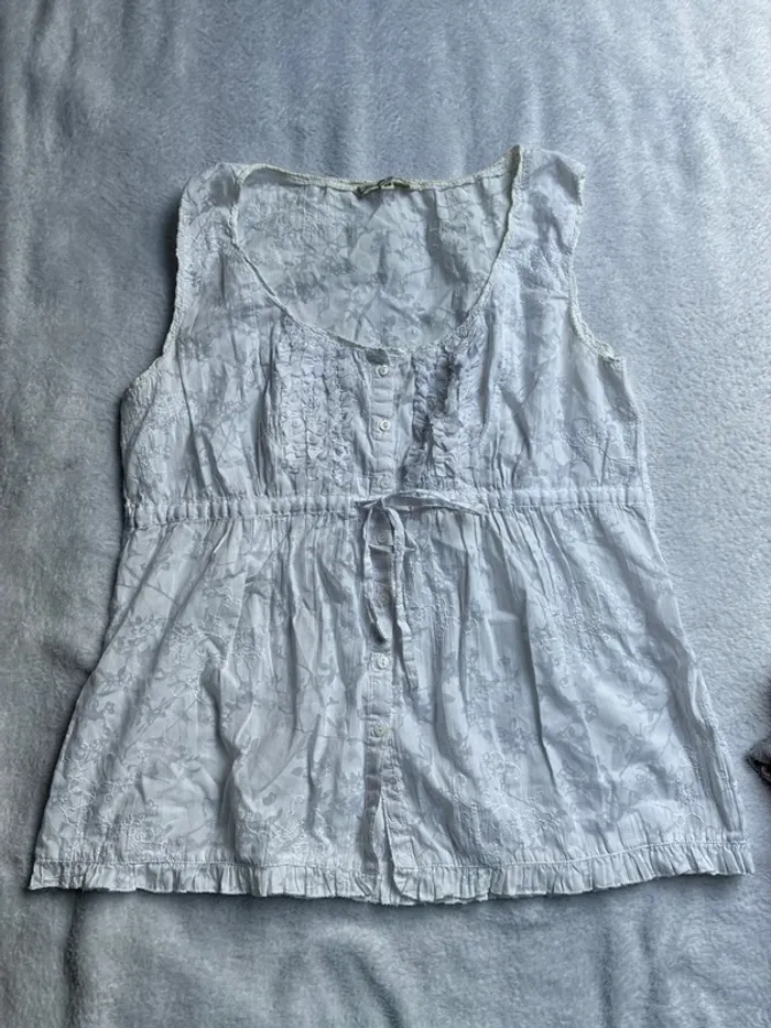 Petite blouse sans manche