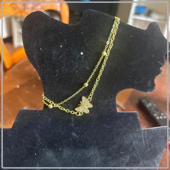 Bracelet cheville papillon doree