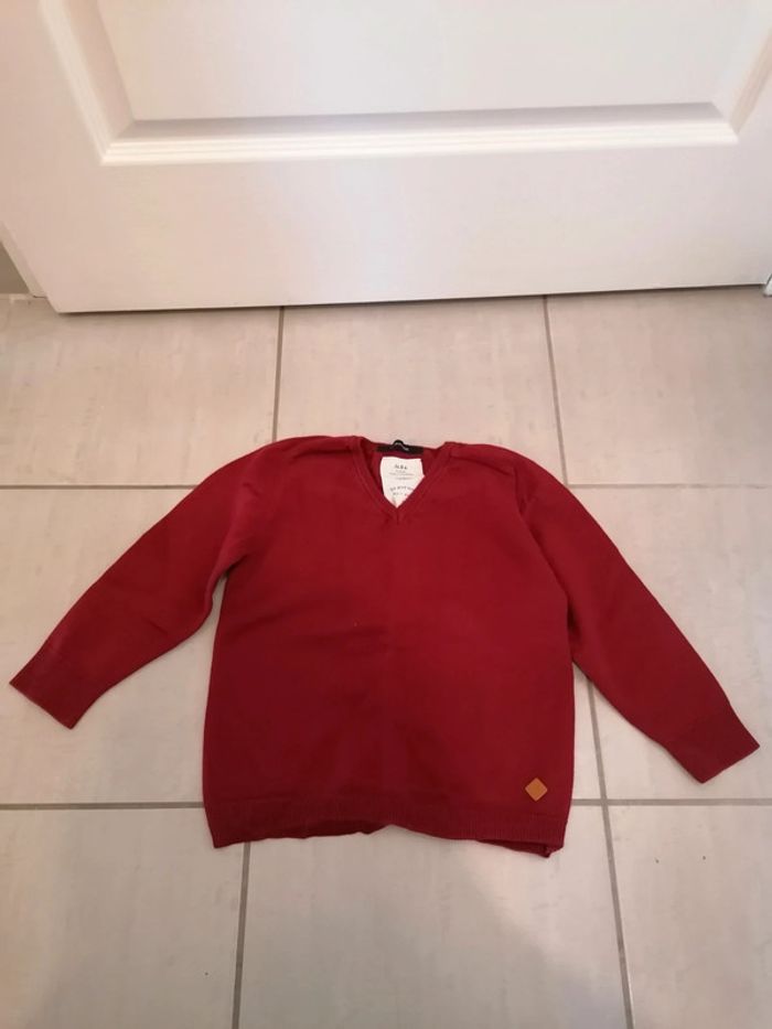 Pull col V très bon état
