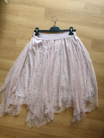 Jupe élastique taille L rose avec étoiles argentées