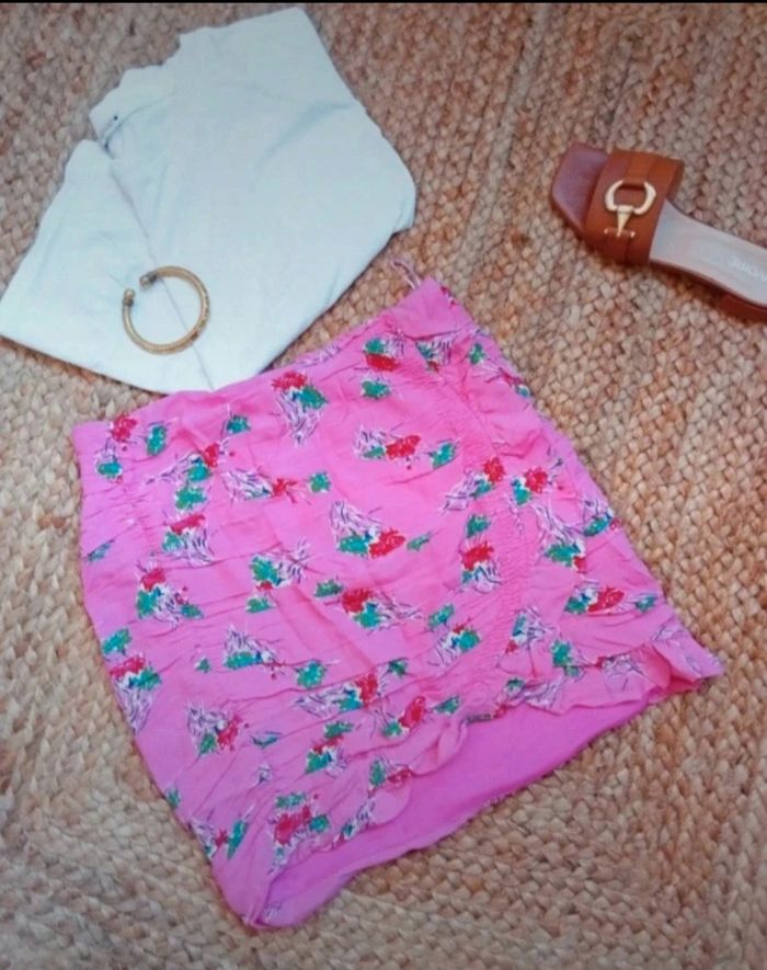 Jupe rose drapee